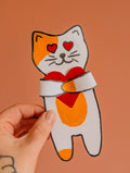 Kina de knuffelkat